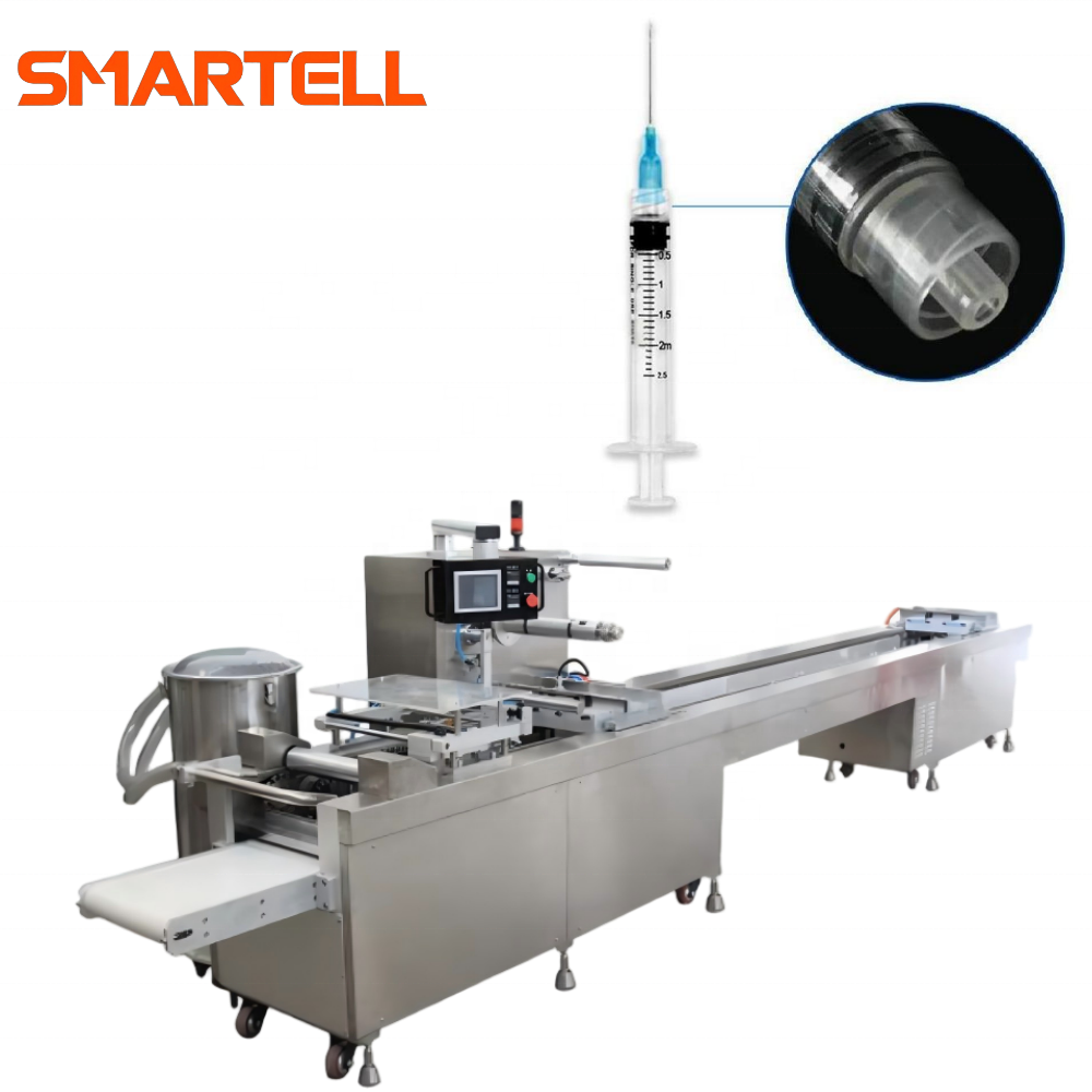 Machine de fabrication de seringues de sécurité rétractables